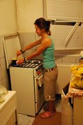 Raluca cooking (Codlea, Romania) resize