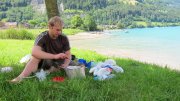 Cris cooking by the lake (Lungern, Switzerland)