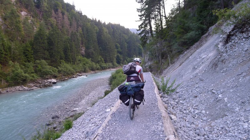 Cris riding along next to river (near Chur, Switzerland)