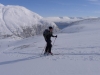 Cris ascending with fiord in background (Daltinden, Norway)