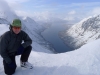 Cris on summit with fiord behind 2 (Rørnestinden, Norway)
