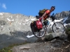 Cris pushes his bike up to Sertigpass (Switzerland)