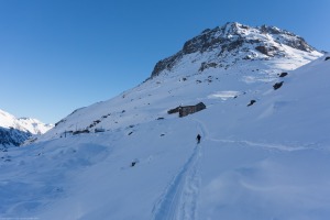 Leonie leaving the hut (Ski touring Jamtalhuette)