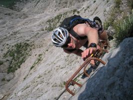 Cris reaches for ladder (Lago di Garda, Italy)