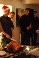 Preparing to cut the bird 2 (Thanksgiving Dinner, Freiburg)