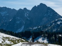 Johannes on his bike in patches of snow (Autumn adventures Dachstein Sept 2024)