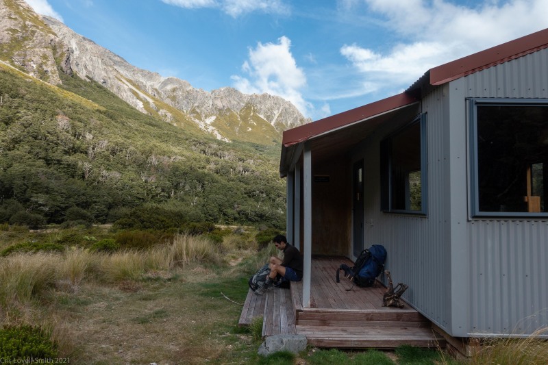 Taking off boots (Avalanche Crow Tramp April 2021)