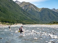 Simon and Katie cross the Poulter river (Bikepacking Poulter Jan 2024)