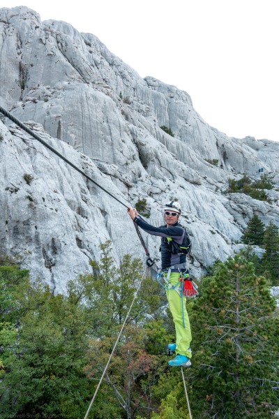 Cris on a rope bridge (Climbing Croatia Oct 2022)