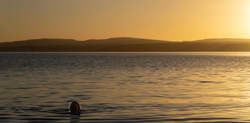 Rachel goes swimming (Climbing Kawakawa Bay Jan 2022)