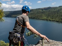 Craig throws the rope down from the top of Captain Caveman (Climbing Kawakawa Bay Jan 2022)