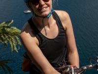 Rachel abseiling from the top of Captain Caveman (Climbing Kawakawa Bay Jan 2022)