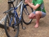 Cris attempts to fix Leonie\'s gears (Mallorca)