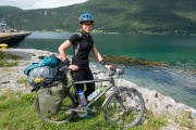 Leonie and her bike at the sea (Cycle Touring Norway 2016)