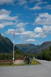 Leonie by the flag (Cycle Touring Norway 2016)