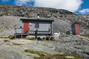 Taking a break by the hut (Cycle Touring Norway 2016)