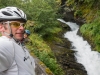 Cris, Leonie, and waterfall (Cycle Touring Norway 2016)