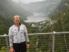 Cris with Geiranger below (Cycle Touring Norway 2016)