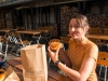 Leonie presents her baked goods (Cycle Touring Norway 2016)