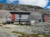 Taking a break by the hut (Cycle Touring Norway 2016)