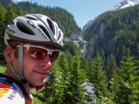 Cris and pass road behind (Cycling Switzerland June 2014)