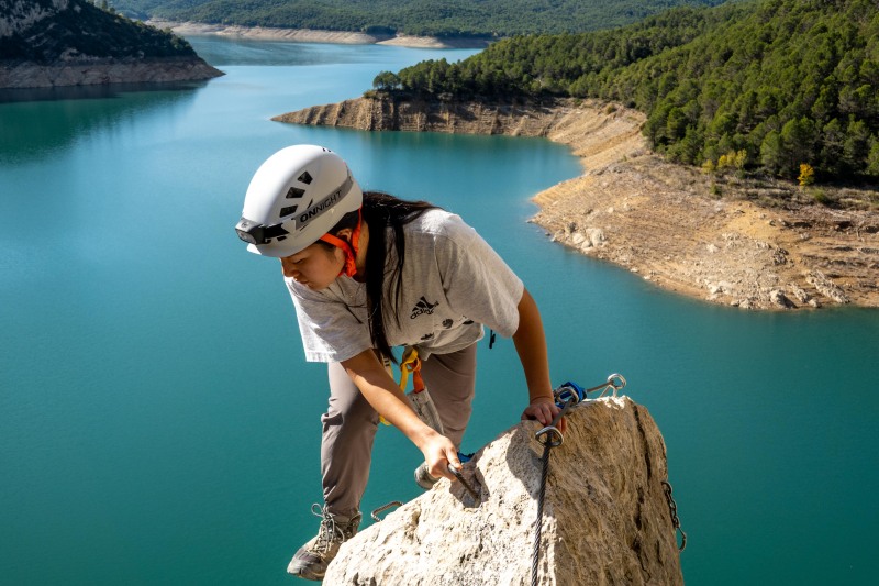 Mei climbing carefully (Ferrata Adventures Ager Oct 2025)