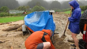 Dad and Gina trying to get the boat ready for towing (Ligar Bay)
