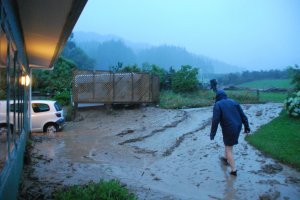 Debris flow against the white car (Ligar Bay)
