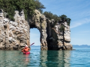 Kayaking to the arches in Wainui Inlet