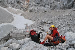 Cris and Em at bottom of cliffs (Triglav Nat. Park, Slovenia)