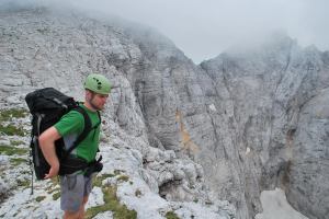 Cris looks over cliff (Triglav Nat. Park, Slovenia)