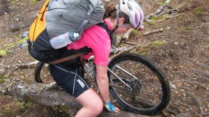Katie mountaineering with her bike (30th Birthday Bash)