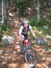 Emily descending through forest (Lago di Garda, Italy)