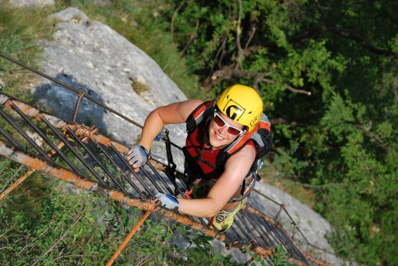 Emily on klettersteig ladder (Lago di Garda)