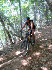 Frauke descending through forest (Lago di Garda, Italy)