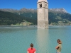 Emily and Frauke watch the church swim (Reschenpass, Italy)