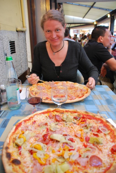Eating pizza (Lago di Garda, Italy)