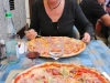 Eating pizza (Lago di Garda, Italy)