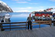 Cris and skis beside the sea (Lyngen Alps, Norway)