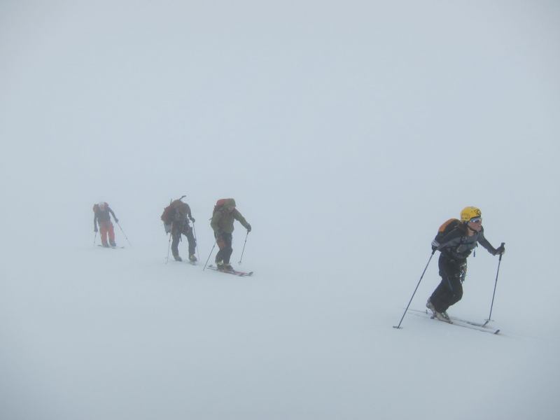 Trekking through the mist (Langdalstindane, Norway)