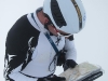 Chris reading the map in white out (Langdalstindane, Norway)