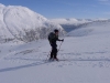 Cris ascending with fiord in background (Daltinden, Norway)