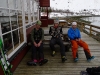Cris, Hallvard, and Aly on the deck (Lyngen Alps, Norway)