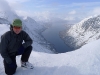 Cris on summit with fiord behind 2 (Rørnestinden, Norway)
