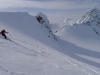 Emily skiing off the summit (Tafeltinden, Norway)