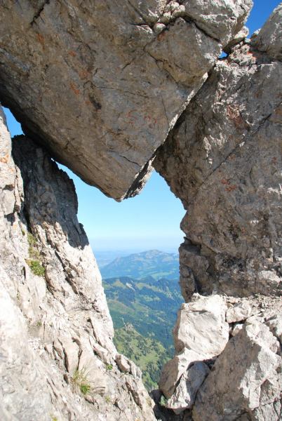View through rock (Nebelhorn Klettersteig, Germany)