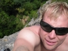 Cris climbing at the sea cliffs (Takaka, NZ)