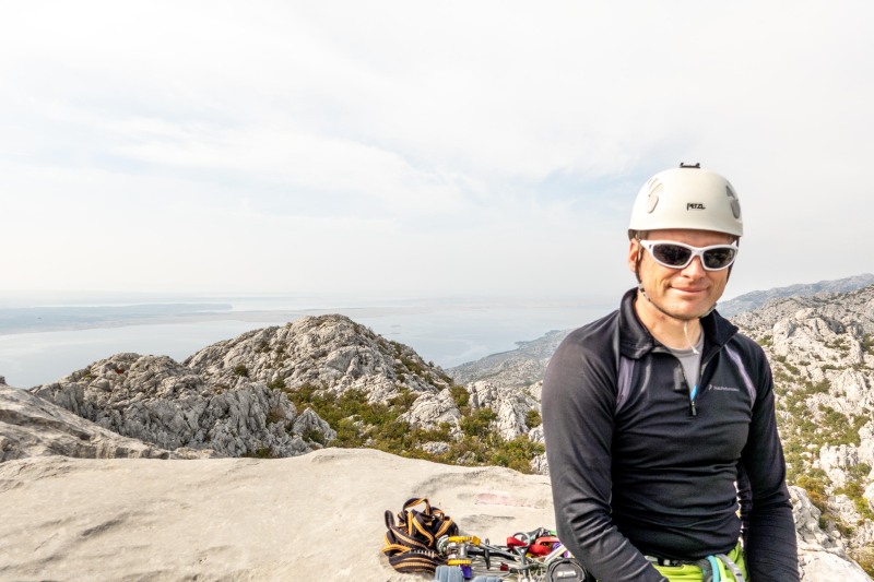 Cris at the top of the climb (Climbing Croatia Oct 2022)