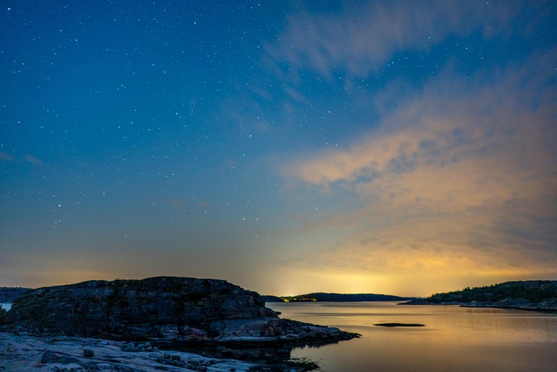 Stars in the sky with the glow from sunset (Seakayaking Sweden, August 2024)