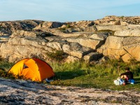 Phil and tent (Seakayaking Sweden, August 2024)